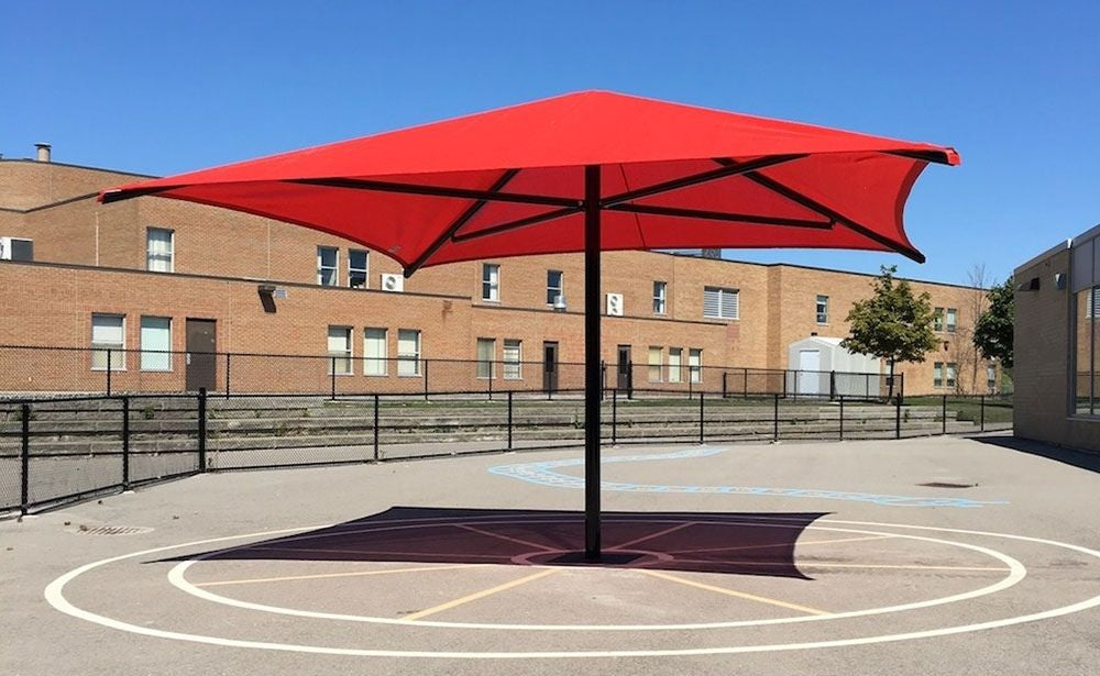 red play shade on a school property providing school shade for kids